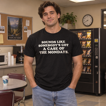 AI-generated lifestyle visualization of a person wearing the black tri-blend Case of the Mondays quote T-shirt in a retro office break room