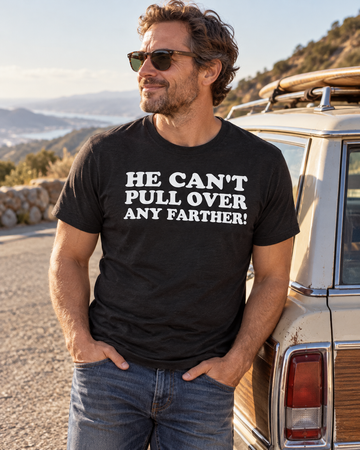 AI-generated lifestyle visualization of a person wearing the He Can't Pull Over Any Farther! black tri-blend quote T-shirt at a sunlit roadside pull-off beside a vintage station wagon