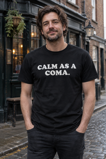 AI-generated lifestyle visualization of a person wearing the Calm as a Coma black quote T-shirt outside a British pub