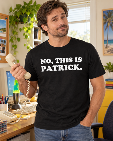 AI-generated lifestyle visualization of a person wearing the No, This Is Patrick black quote T-shirt in a retro office