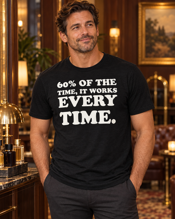 AI-generated lifestyle visualization: person wearing the black tri-blend 60% of the Time, It Works Every Time quote T-shirt in a vintage hotel lounge