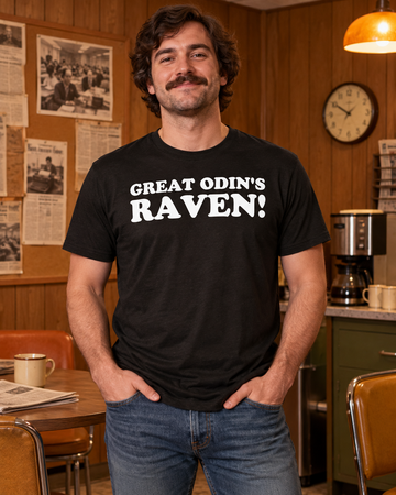 AI-generated lifestyle visualization: person wearing the black tri-blend Great Odin's Raven! quote T-shirt in a 1970s-inspired local newsroom break area with wood paneling, amber light, and no station branding