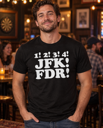AI-generated lifestyle visualization: person wearing the black tri-blend 1! 2! 3! 4! JFK! FDR! quote T-shirt at neighborhood trivia night