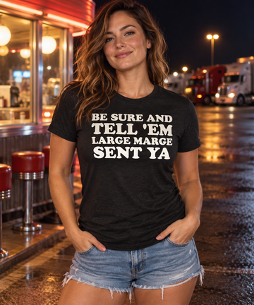AI-generated lifestyle visualization: person wearing the black tri-blend Be Sure and Tell 'Em Large Marge Sent Ya quote T-shirt at a late-night truck-stop diner