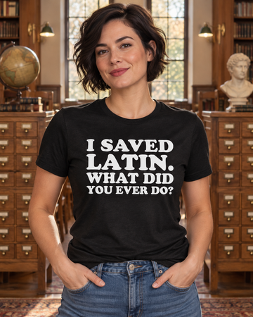 AI-generated lifestyle visualization: person wearing the black tri-blend I Saved Latin. What Did You Ever Do? quote T-shirt in a symmetrical vintage school library with card catalogs, warm wood, and afternoon window light