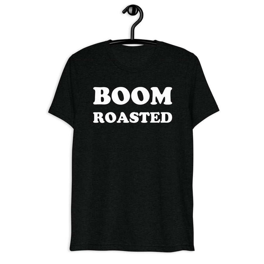 Front hanger mockup of the black tri-blend Boom Roasted quote T-shirt