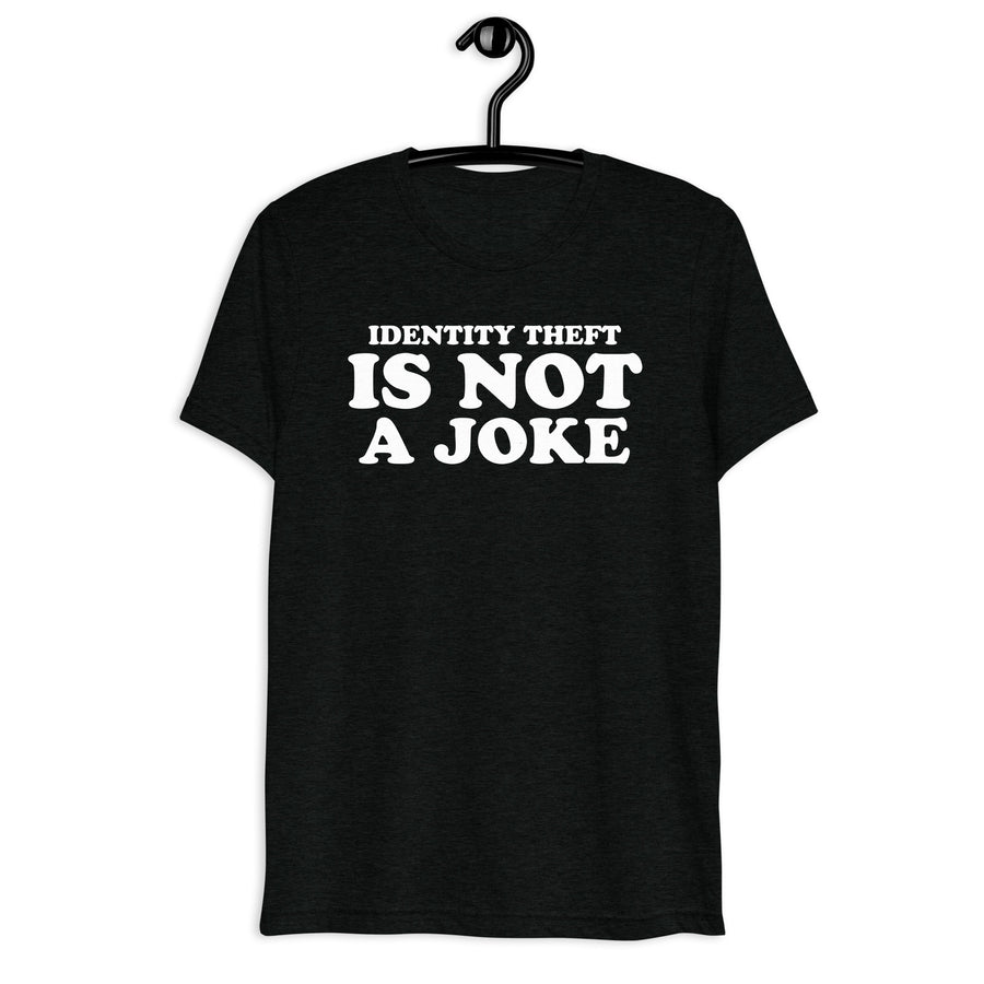 Black tri-blend shirt on front hanger with Identity Theft Is Not a Joke quote