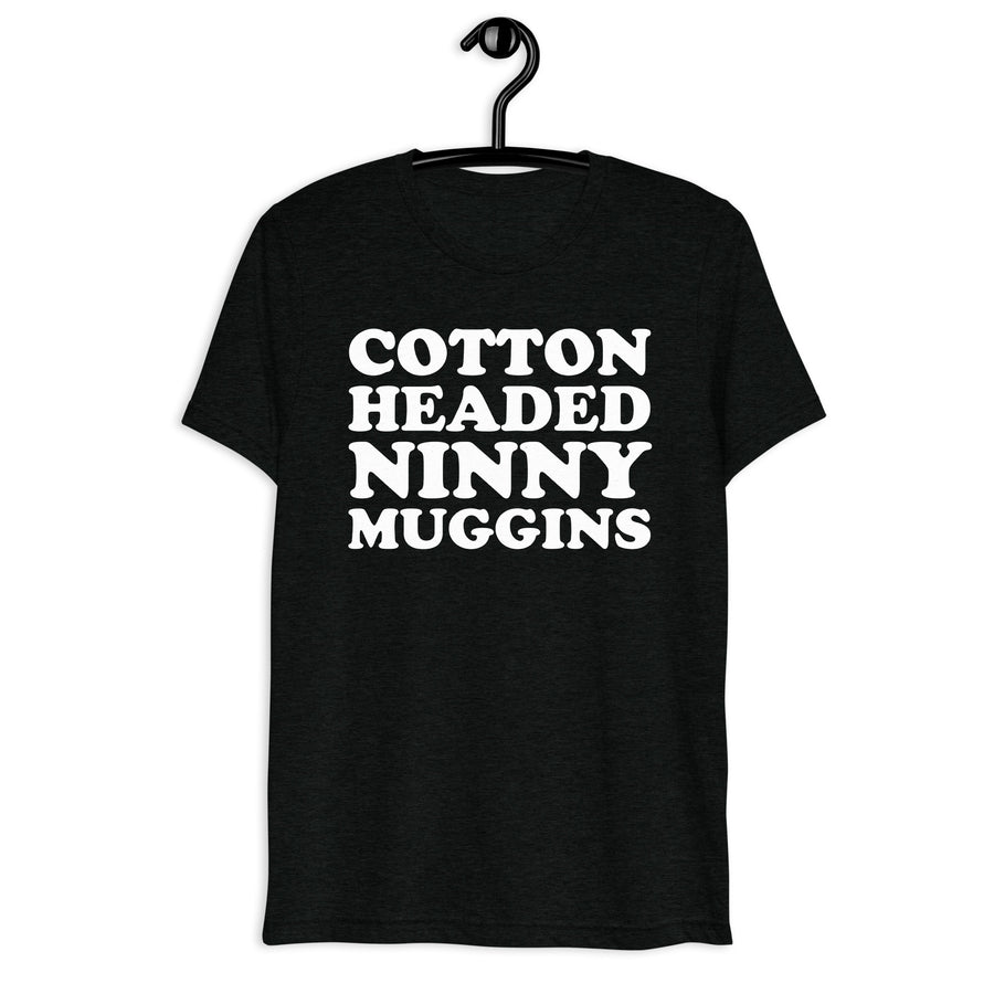 Cotton Headed Ninny Muggins white quote print on a black tri-blend t-shirt, front hanger view
