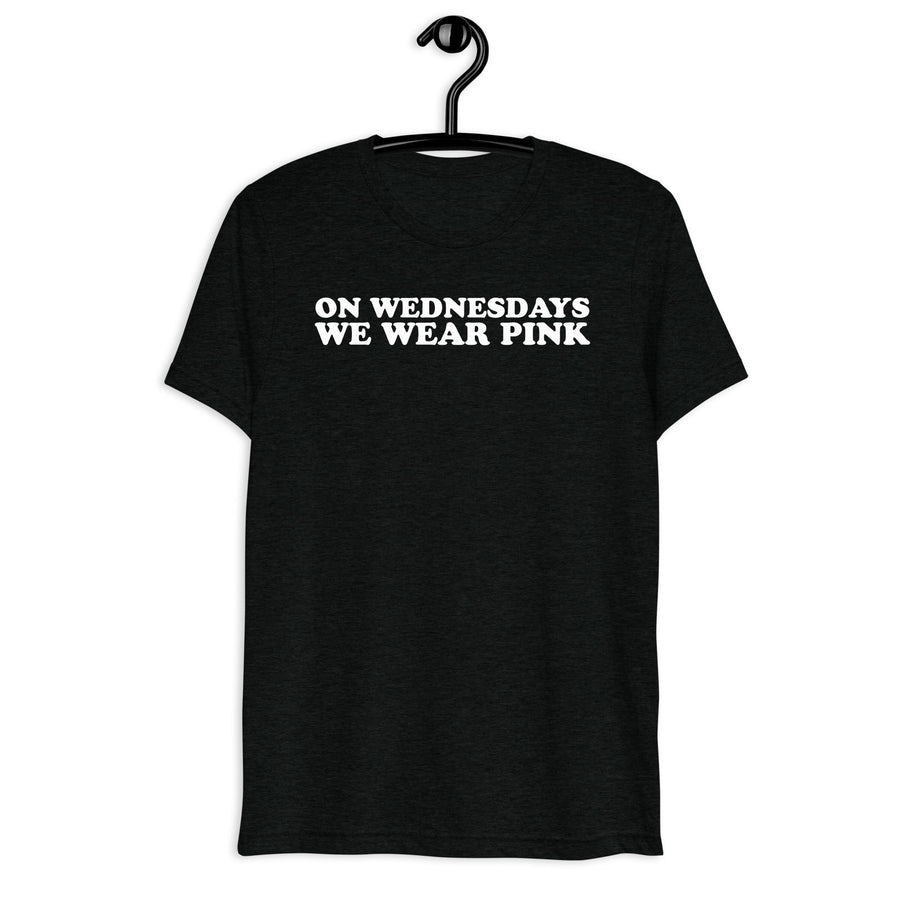 On Wednesdays We Wear Pink white quote print on a black tri-blend shirt, front hanger view