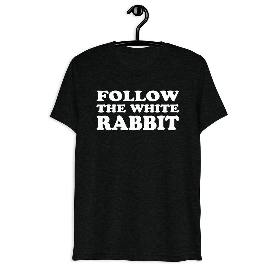 Front hanger mockup of the black tri-blend Follow the White Rabbit quote T-shirt