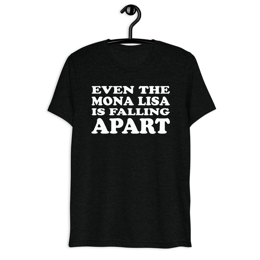 Front hanger mockup of the black tri-blend Even the Mona Lisa Is Falling Apart quote T-shirt