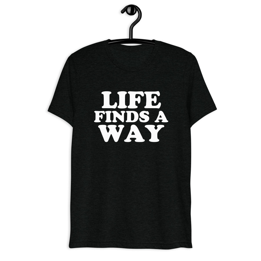 Life Finds a Way in white vintage lettering on a black tri-blend T-shirt, front hanger view
