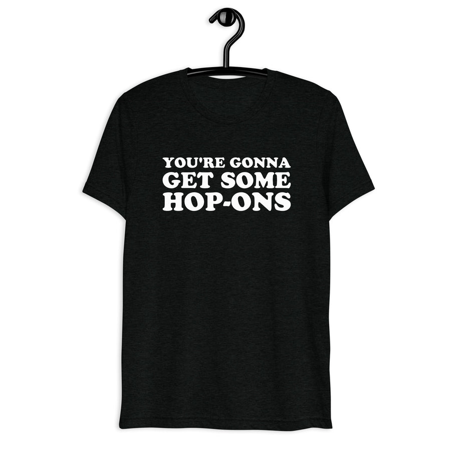 Front hanger mockup of black tri-blend T-shirt with You're Gonna Get Some Hop-Ons quote in white vintage lettering