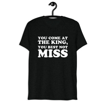 Front hanger mockup of the black tri-blend You Come at the King, You Best Not Miss quote T-shirt