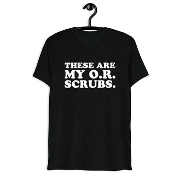 Front hanger view of black tri-blend quote shirt reading These Are My O.R. Scrubs.