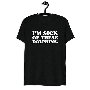 Front hanger view of black tri-blend quote shirt reading I'm Sick of These Dolphins.