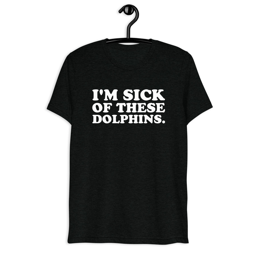 Front hanger view of black tri-blend quote shirt reading I'm Sick of These Dolphins.
