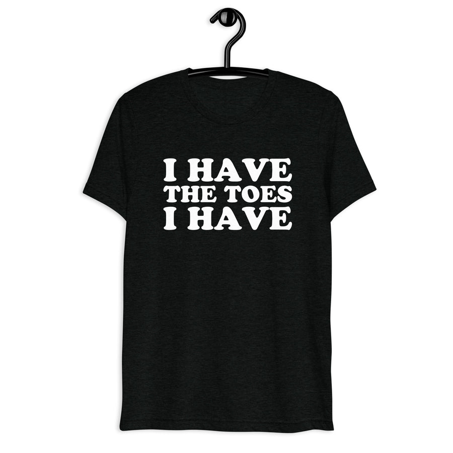 Front hanger view of black tri-blend quote shirt reading I Have the Toes I Have