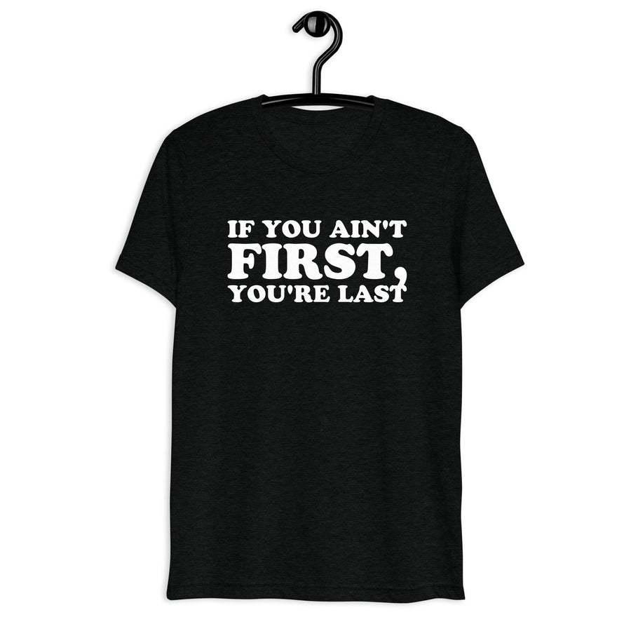 Front hanger view of black tri-blend quote shirt reading If You Ain't First, You're Last