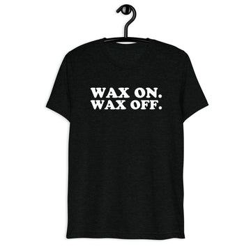 Front hanger view of black tri-blend quote shirt reading Wax On. Wax Off.