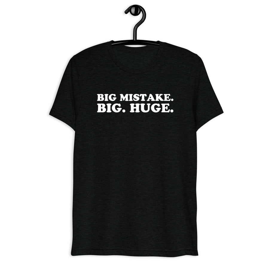 Front hanger view of black tri-blend quote shirt reading Big Mistake. Big. Huge.