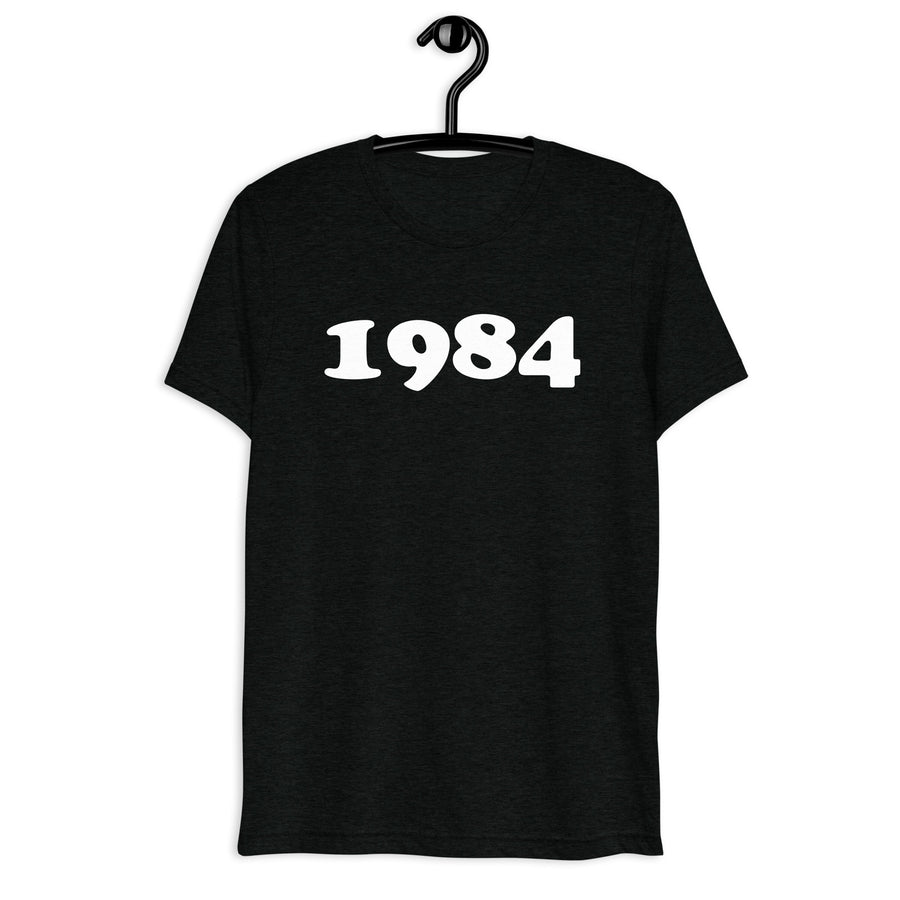 Front hanger view of black tri-blend 1984 Retro Year T-Shirt