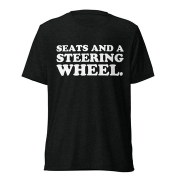 Back hanger view of black tri-blend shirt with Broski Tees VHS collar logo
