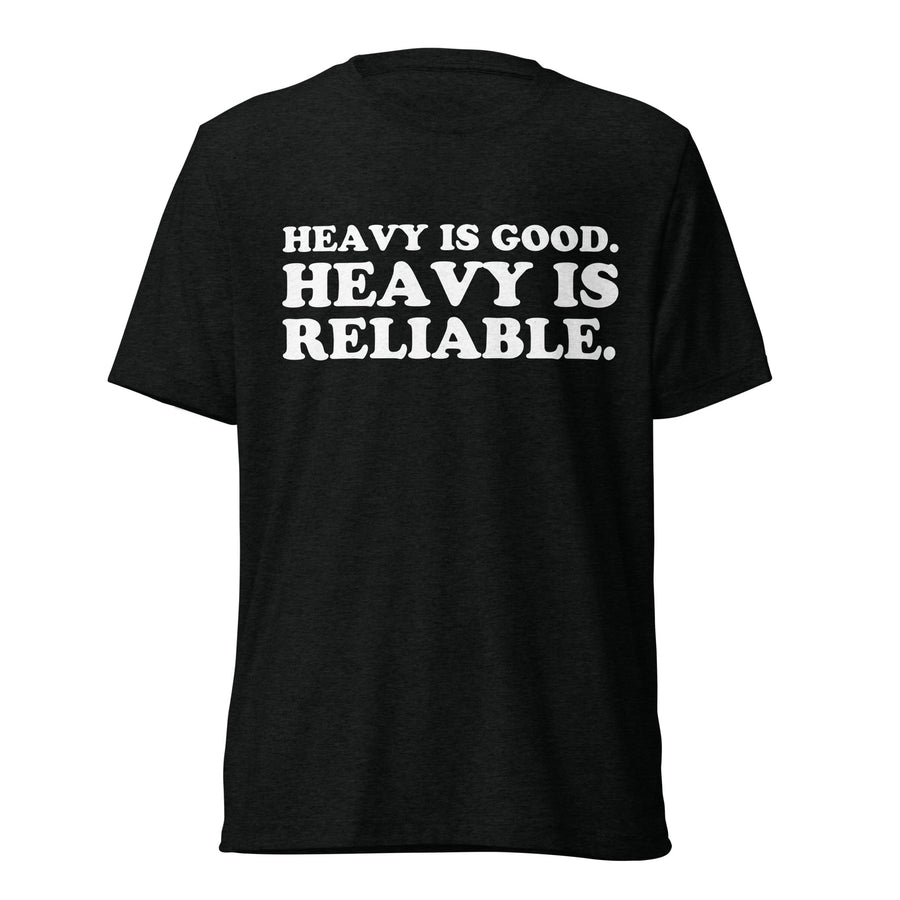 Front hanger view of black tri-blend quote shirt reading Heavy Is Good. Heavy Is Reliable.