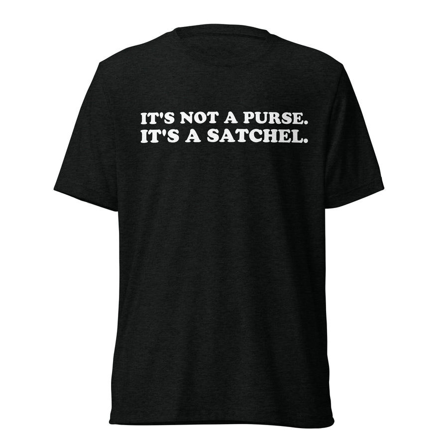 Front hanger view of black tri-blend quote shirt reading It's Not a Purse. It's a Satchel.