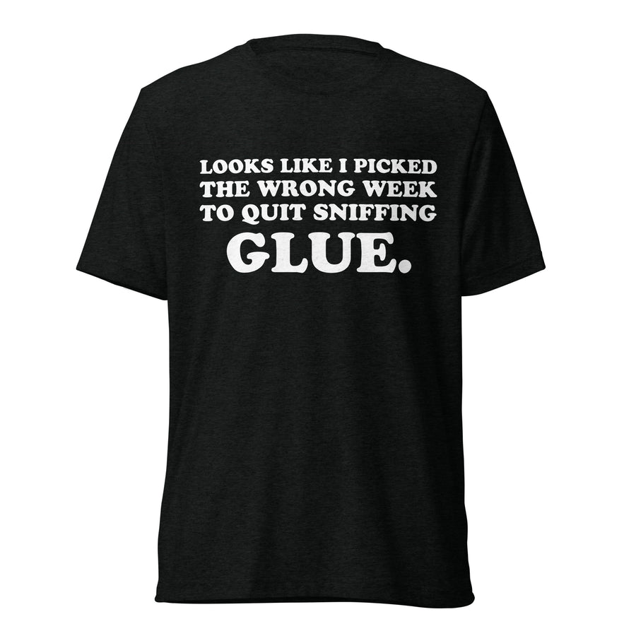 Front hanger view of black tri-blend quote shirt reading Looks Like I Picked the Wrong Week to Quit Sniffing Glue.