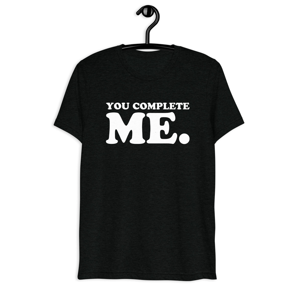 Front hanger view of black tri-blend quote shirt reading You Complete Me.