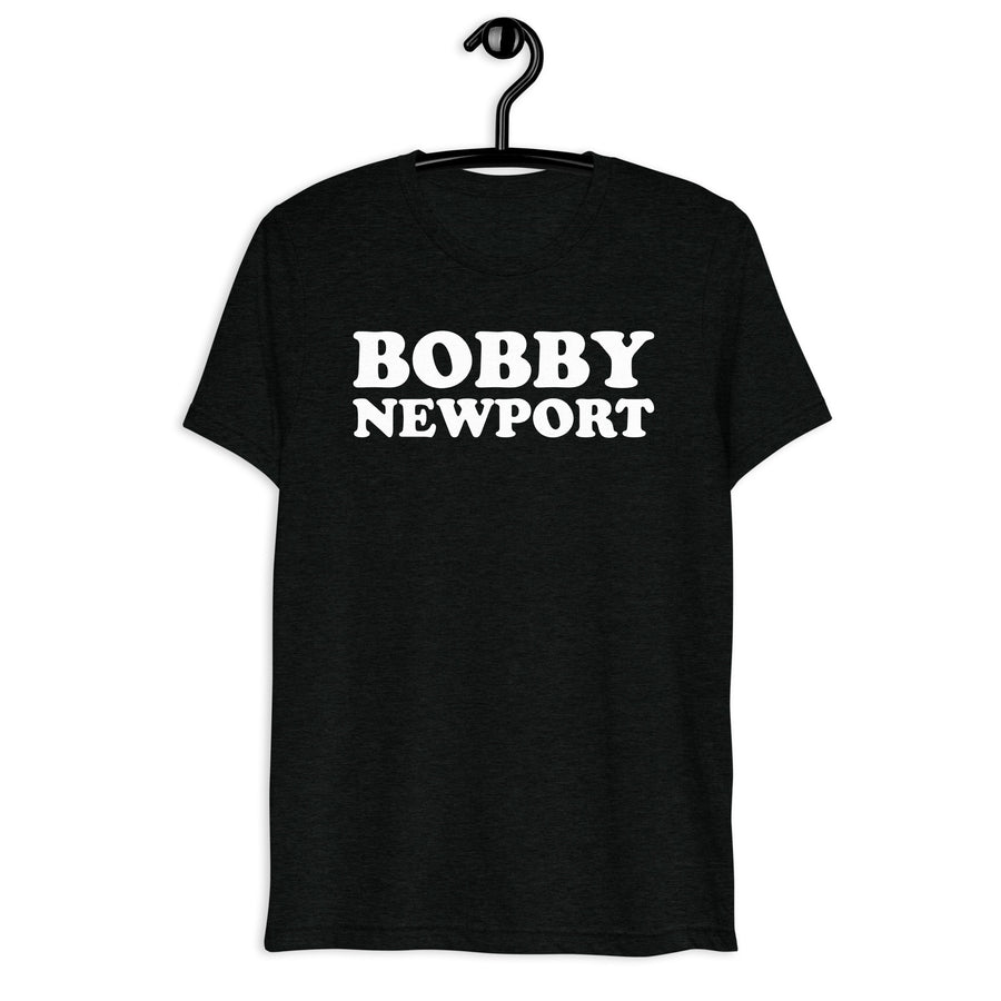 Front hanger view of black tri-blend quote shirt reading Bobby Newport